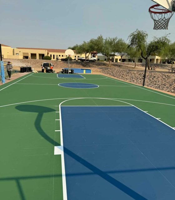 High-quality outdoor basketball court painted by Pelayos Elite Court Painting specialists.