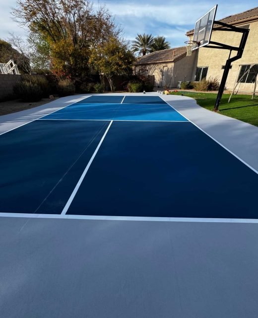 High-quality basketball court resurfacing with weather-resistant paint and smooth finish for optimal play and durability.